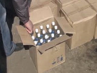 В Кузбассе предприниматель пытался уничтожить спиртосодержащую продукцию