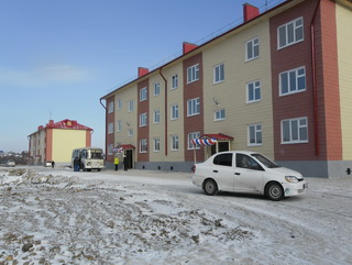 В Кузбассе многодетные семьи получили квартиры в новых многоквартирных домах