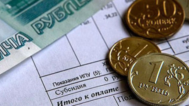 Тулеев потребовал усилить работу с должниками за ЖКУ