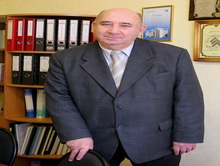 Губернатор А.Г.Тулеев вручил медаль «За особый вклад в развитие Кузбасса» I степени профессору КемГУ Эдуарду Михайловичу Казину